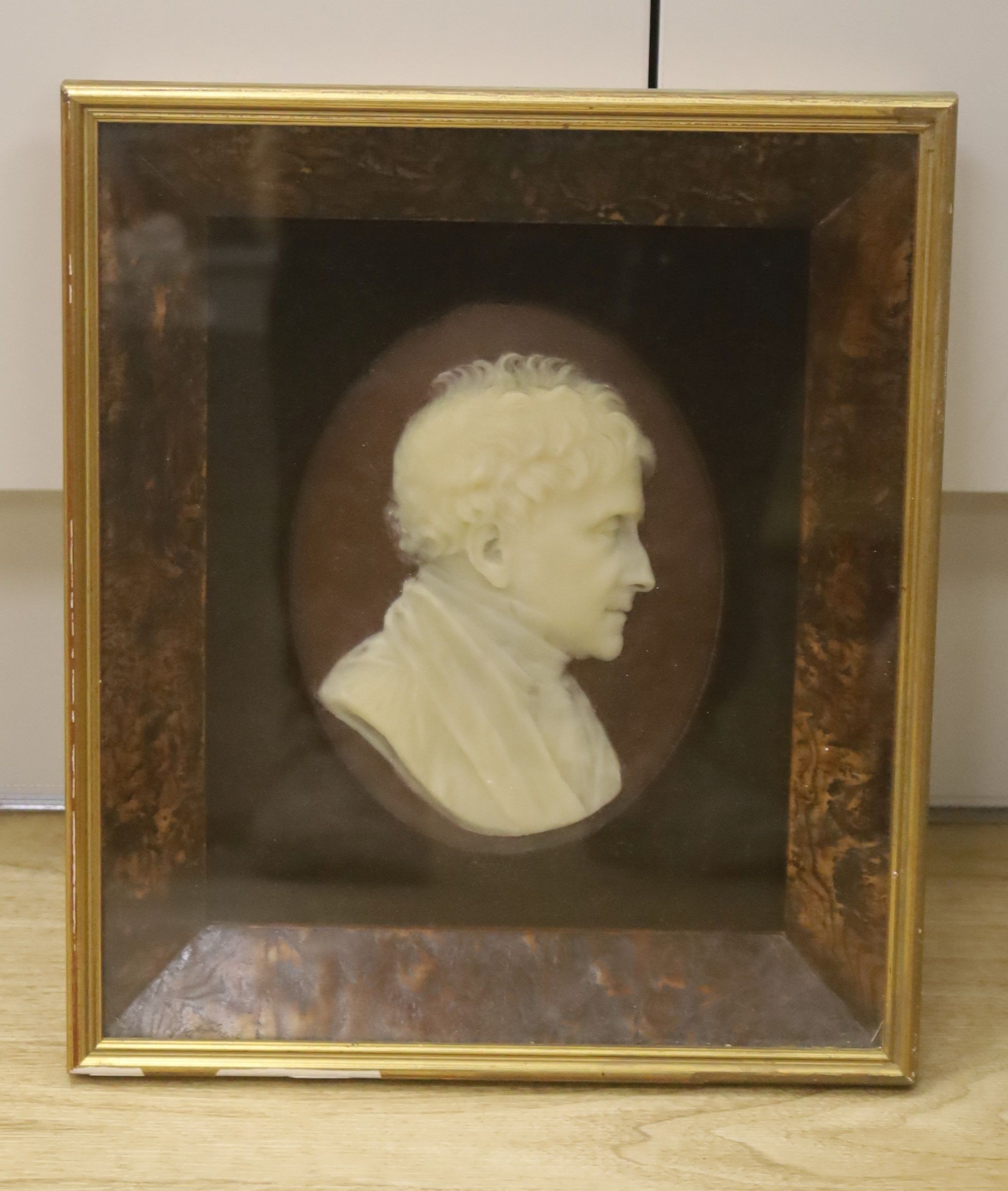 Richard Cockle Lucas, The Very Rev. Thomas Garnier, Dean of Winchester, 1852, in profile to Dexter, signed, inscribed and dated, a wax profile portrait, overall 31 x 27cm